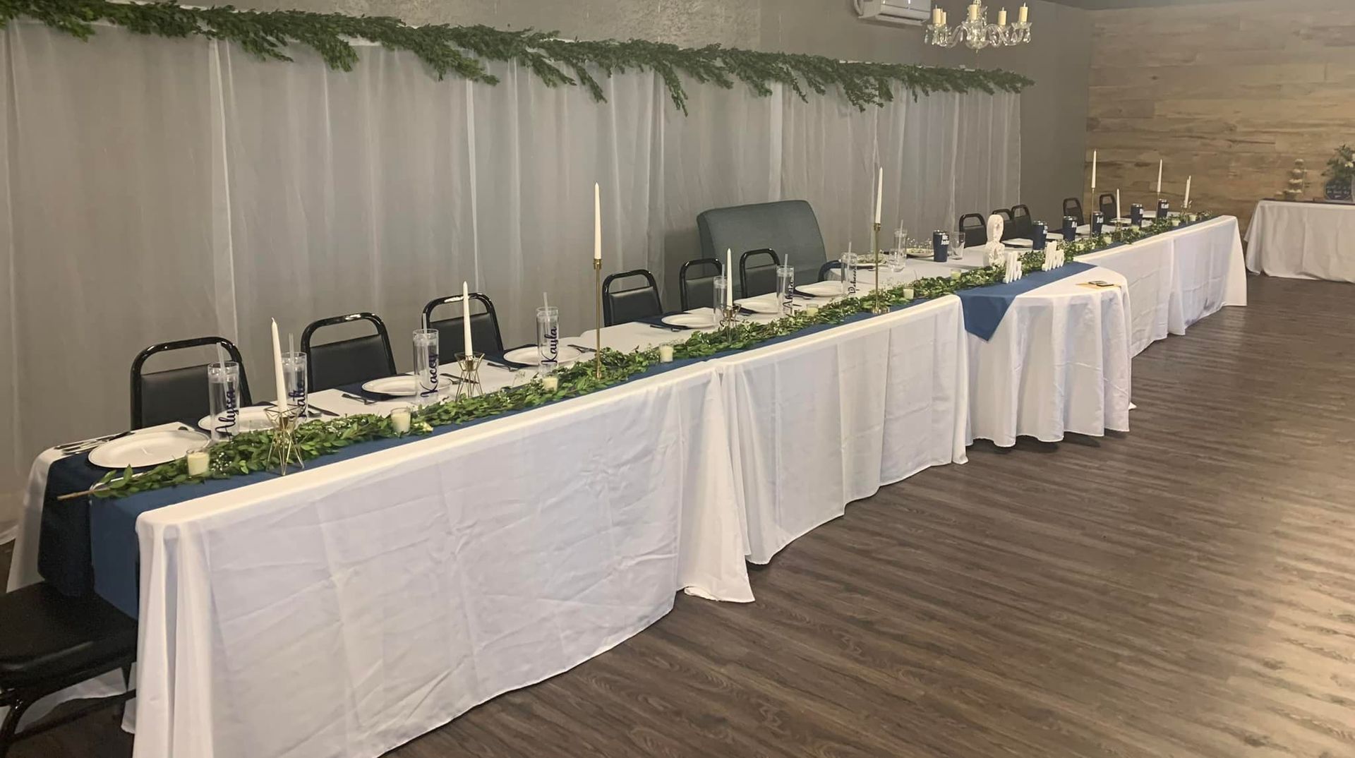 There is a long table in the middle of the room.