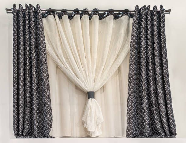 Curtain with a white and black pattern.