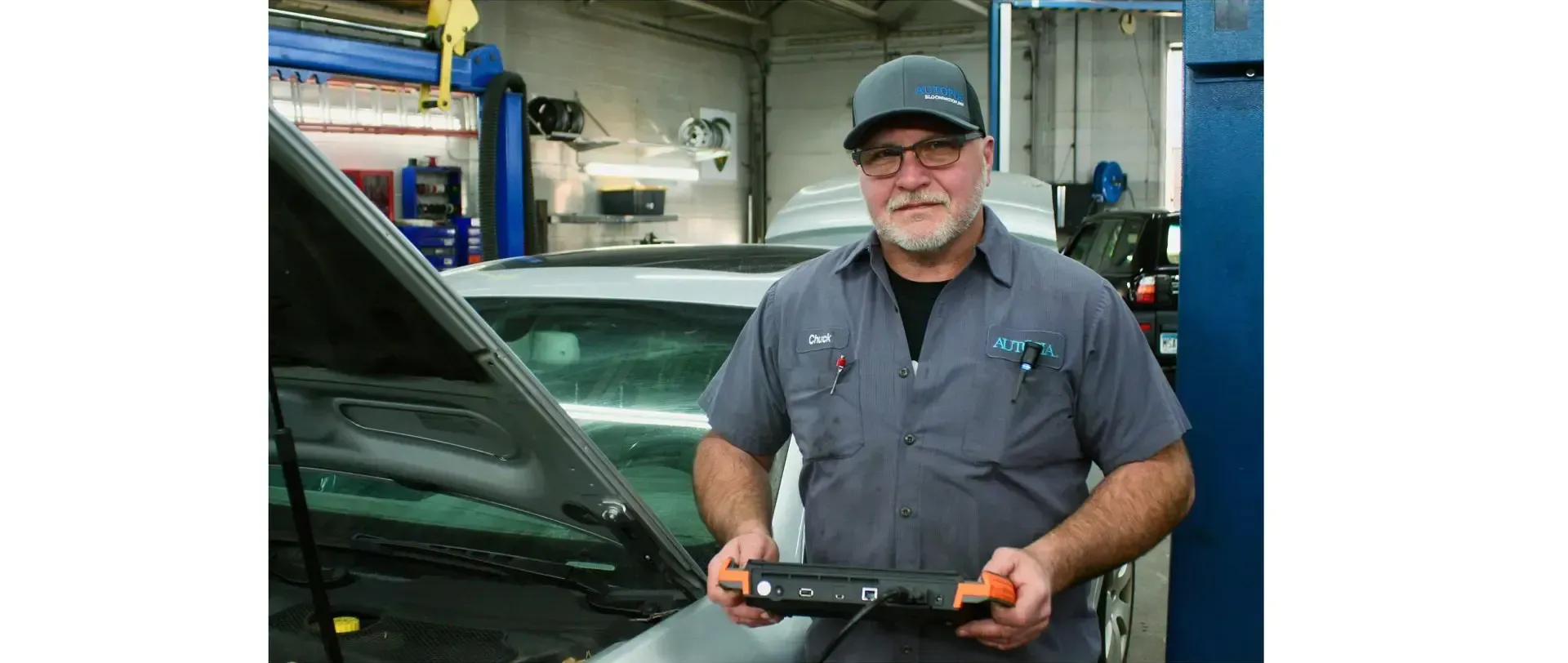 Mechanic doing diagnostics | Autopia Auto Repair - Bloomington