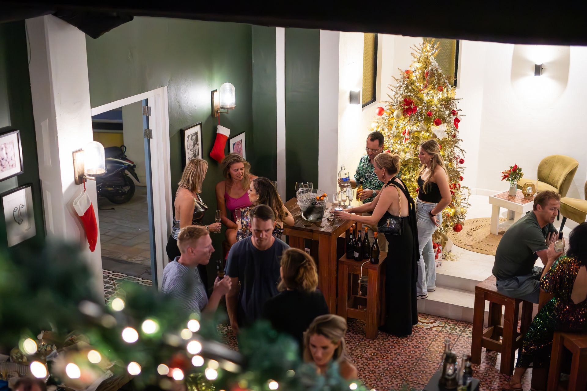 A close up of a plate of french fries on a wooden table.