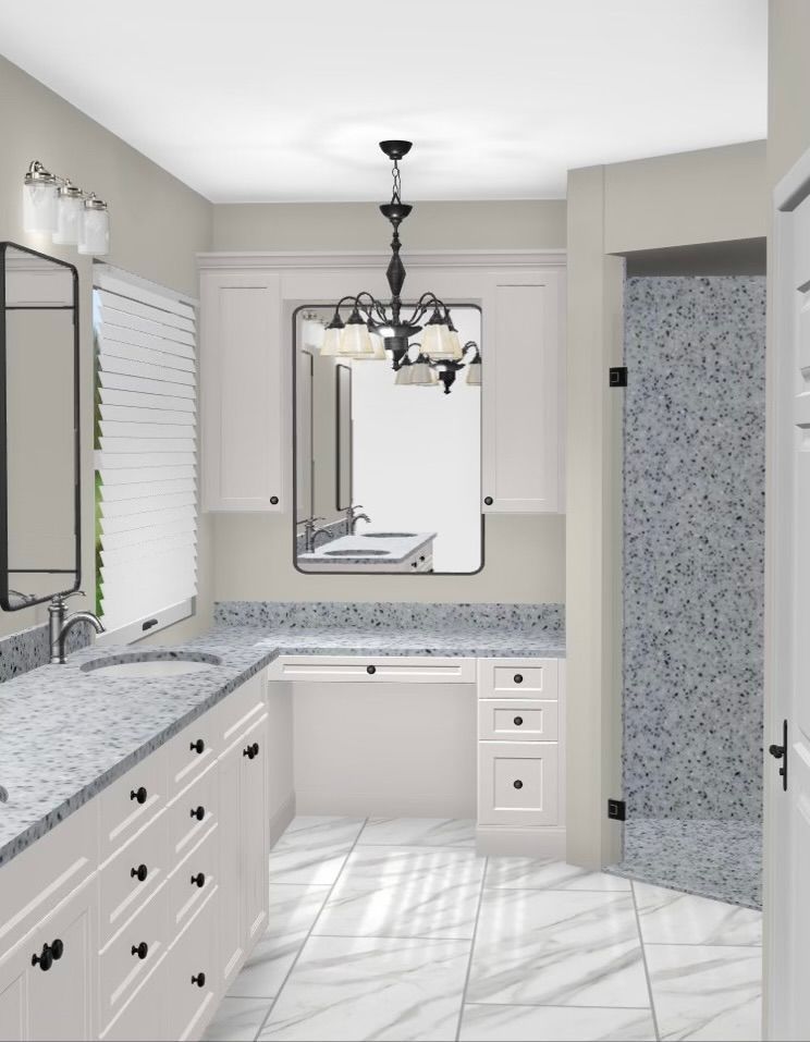 Interior designers reviewing floor plans and space planning layouts