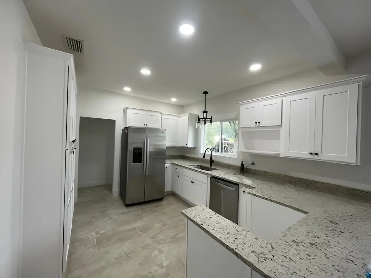 Modern kitchen and dining remodel with wood finishes and contemporary design