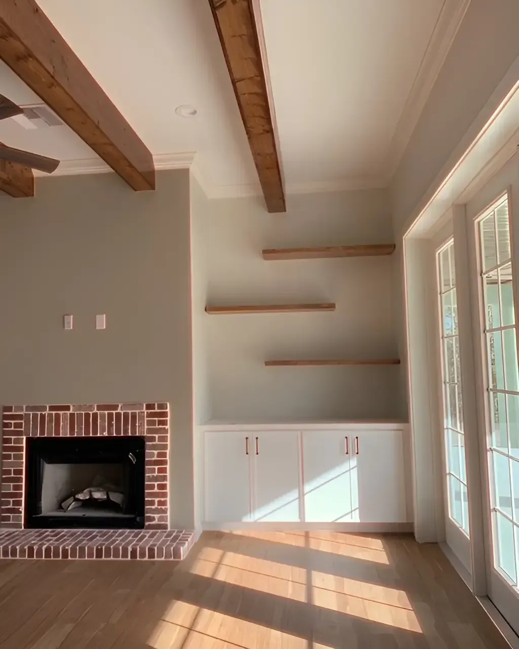 Cozy living space with chairs, plants, and curated interior design elements