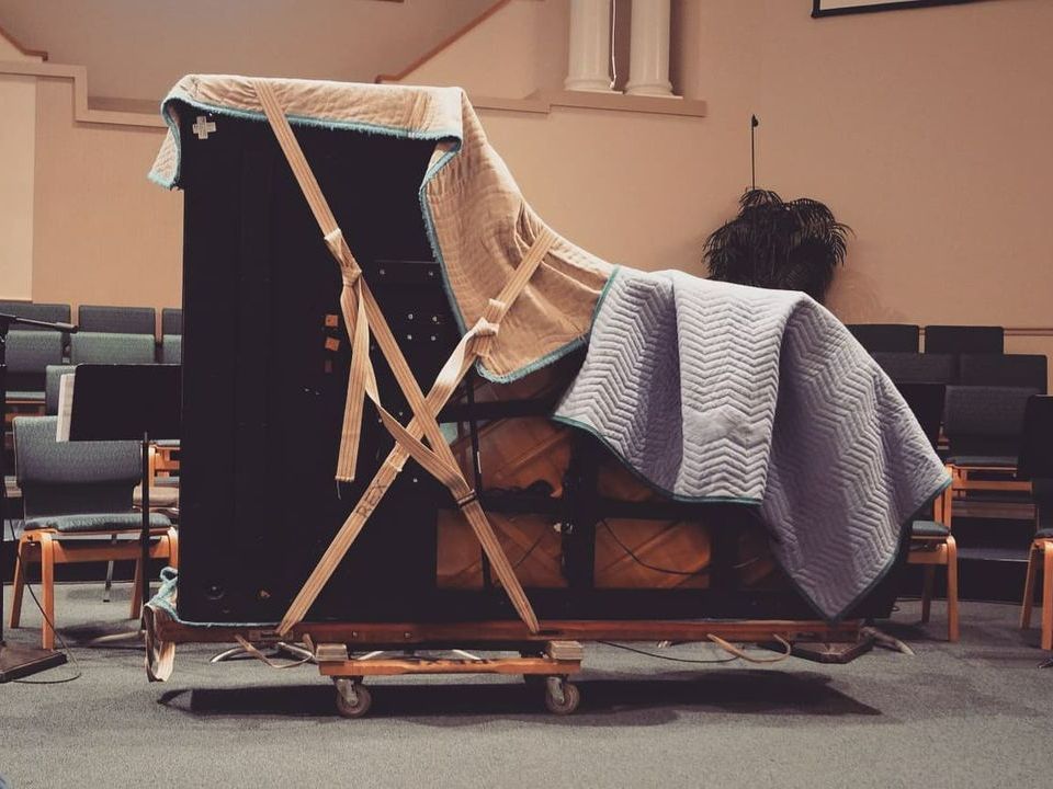 A Living Room With A Piano — Tully, NY — Tritone Pianos