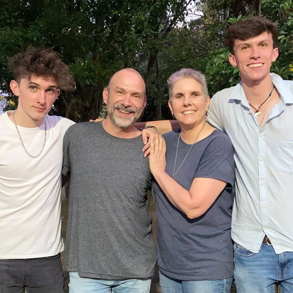 A group of people are posing for a picture together.