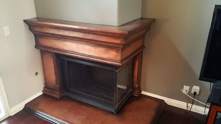 antiqued copper fireplace