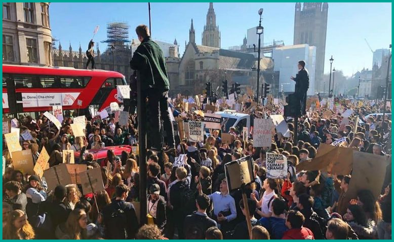 Government building & crowded streets symbolising physical & digital threats to democracy & security