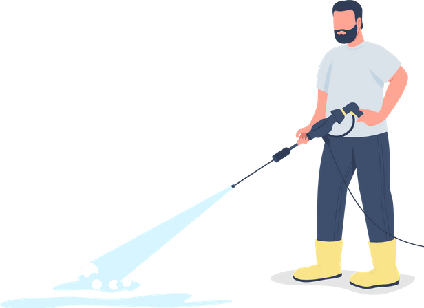 a man is using a high pressure washer to clean a puddle of water .