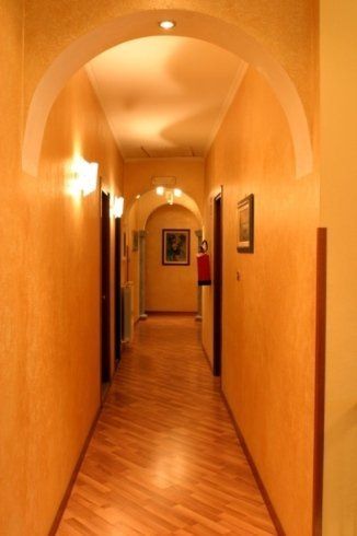 corridoio su cui si affacciano le stanze