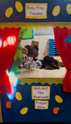 A puppet show is being performed at the roly poly theatre