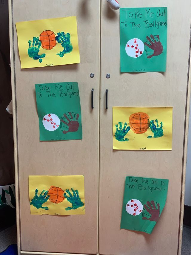 A closet with a bunch of papers on it that say take me out to the ballgame