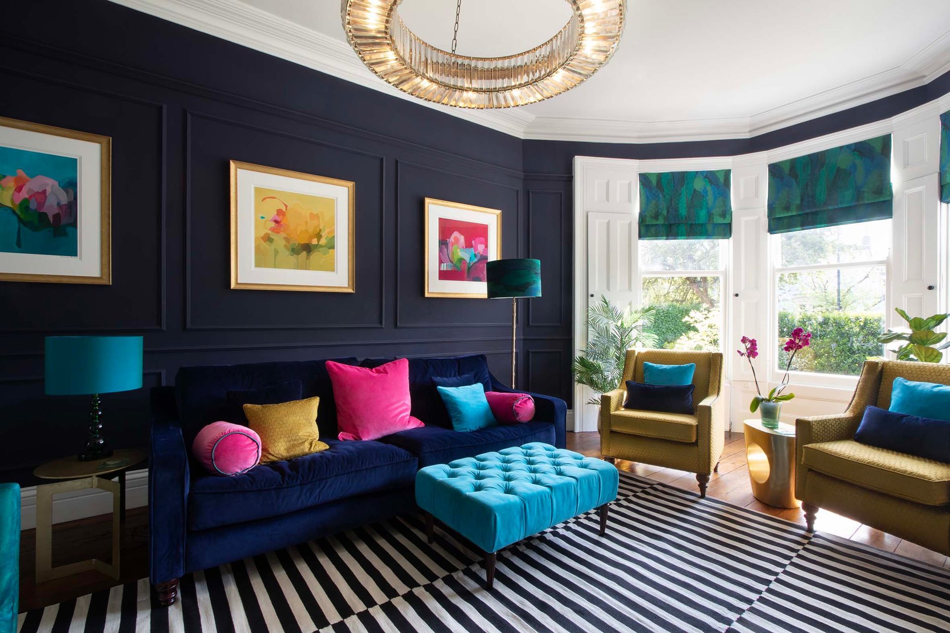 Colourful interior designed by K Interiors. Dark blues, teals, pinks and yellows.