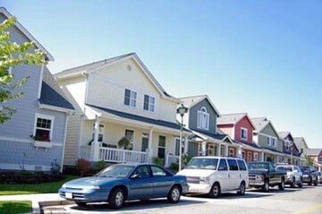 Residential homes with cars - homeowners insurance in Brockton, MA