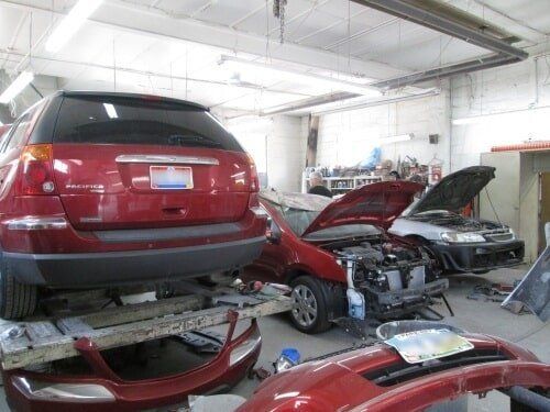 Cars for Repair in Cua Shop — Dover, OH — Cua Refinishing Co.