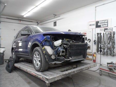 Blue Damaged Car — Dover, OH — Cua Refinishing Co.