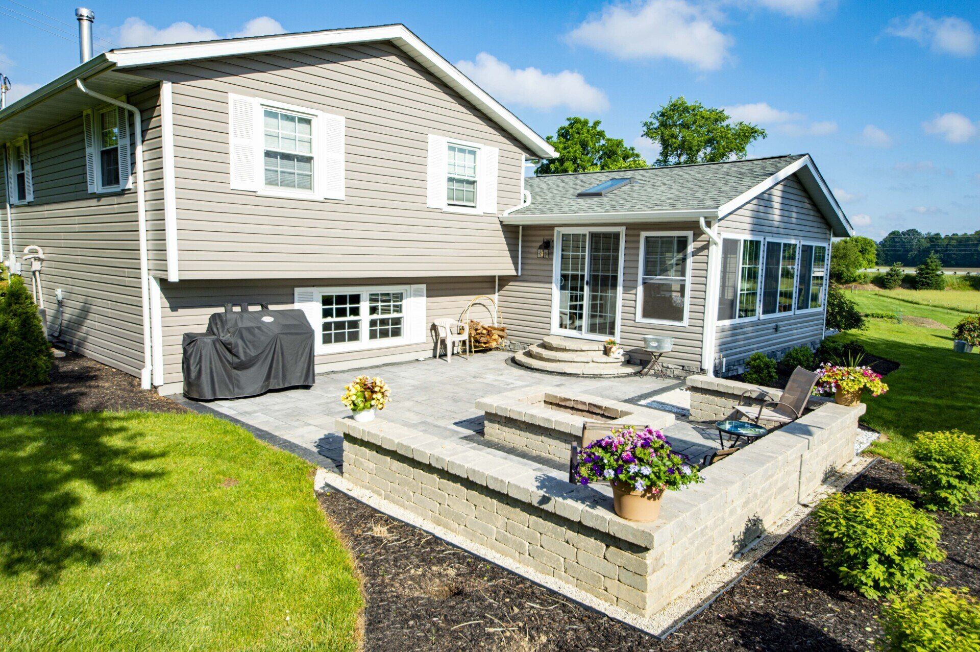Finished stone patio and retaining wall