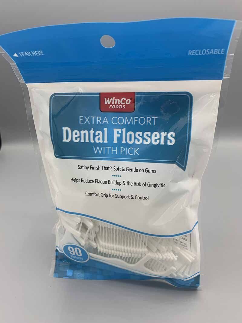 A bag of extra comfort dental flossers with pick