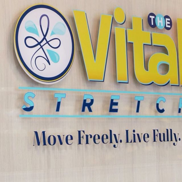 A sign that says the vital stretch move freely live fully