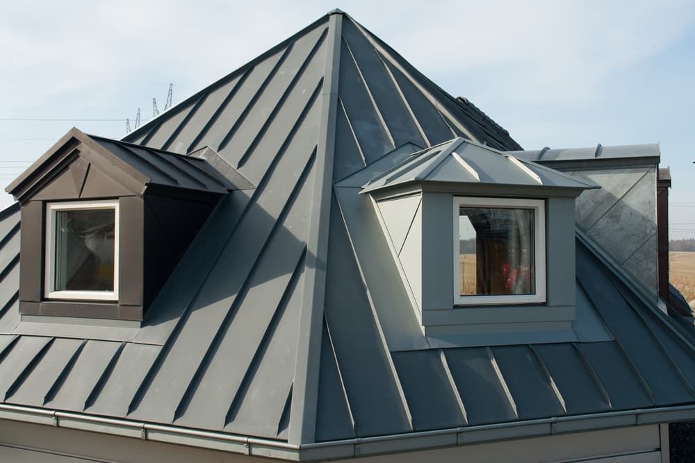 A House with A Metal Roof and A Window — Rooftop Northern Rivers In Ballina, NSW