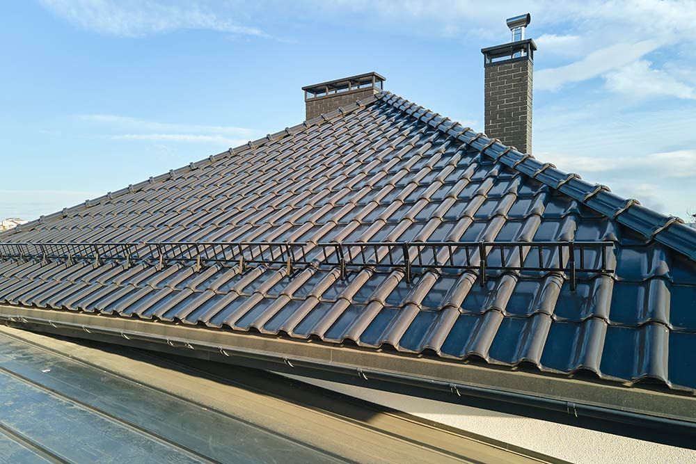 A Roof With a Chimney on Top of It — Rooftop Northern Rivers In Ballina, NSW
