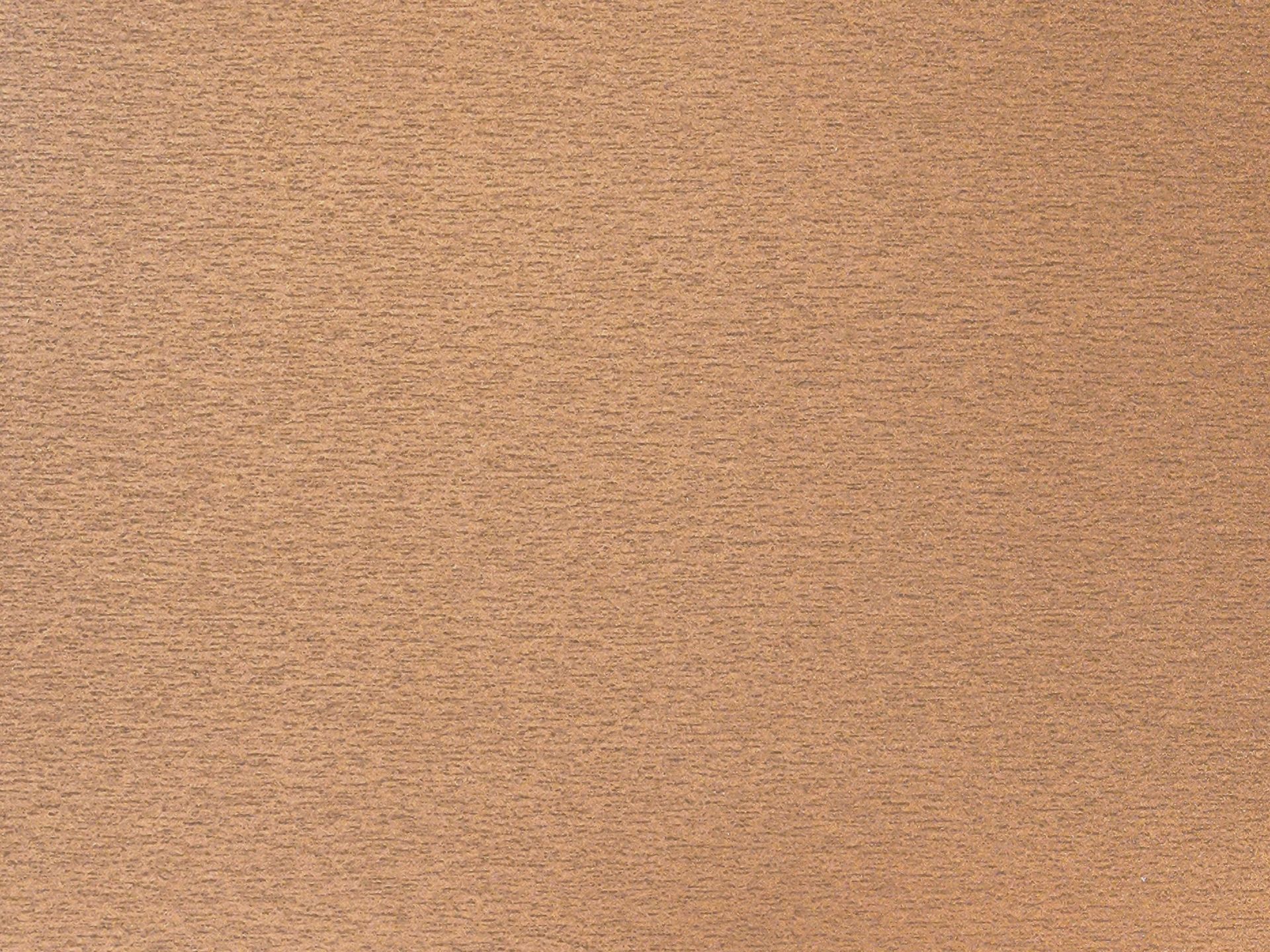 Tan, textured surface, likely a cork or similar material.
