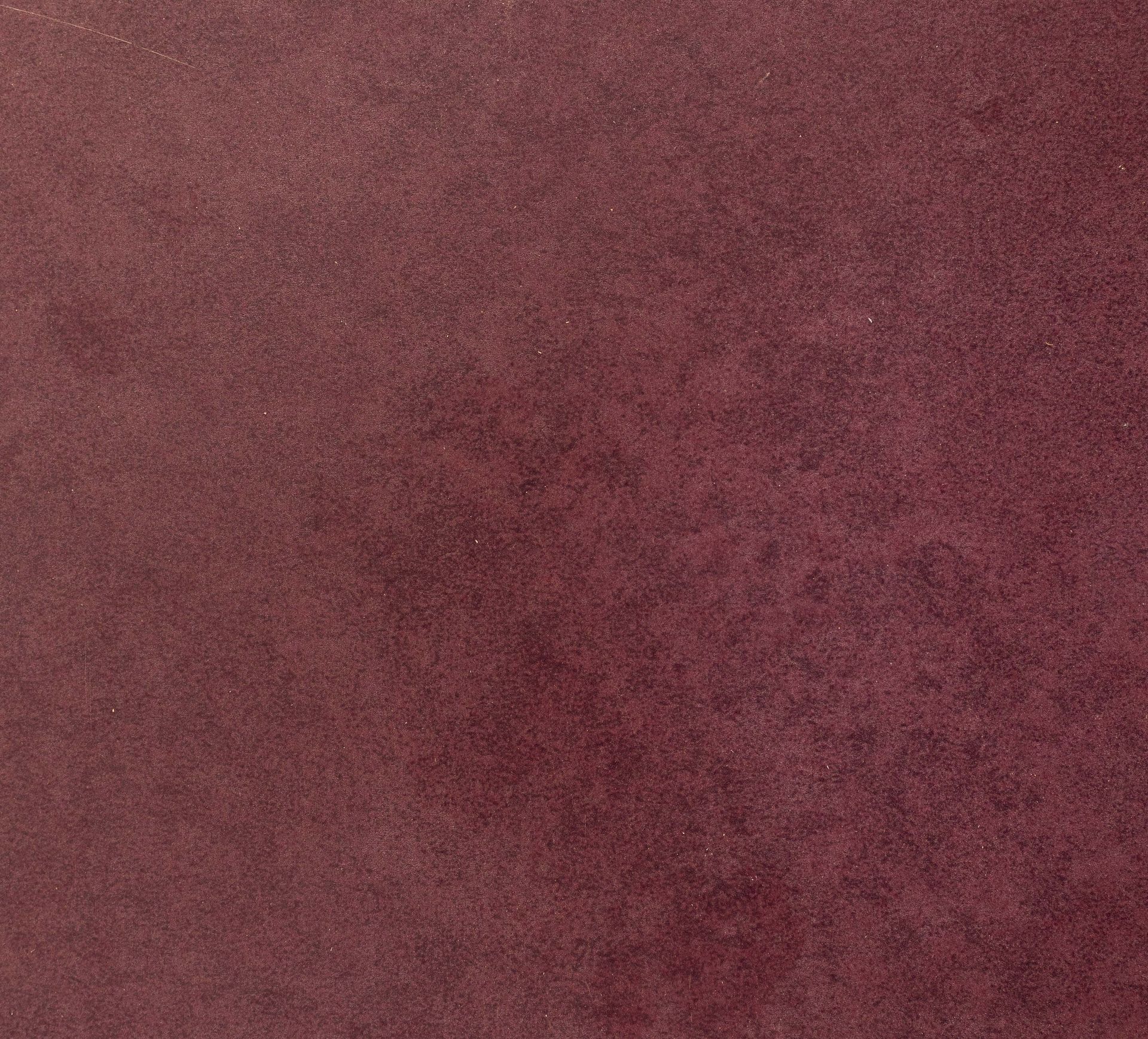 Burgundy suede texture with subtle, glittering speckles.