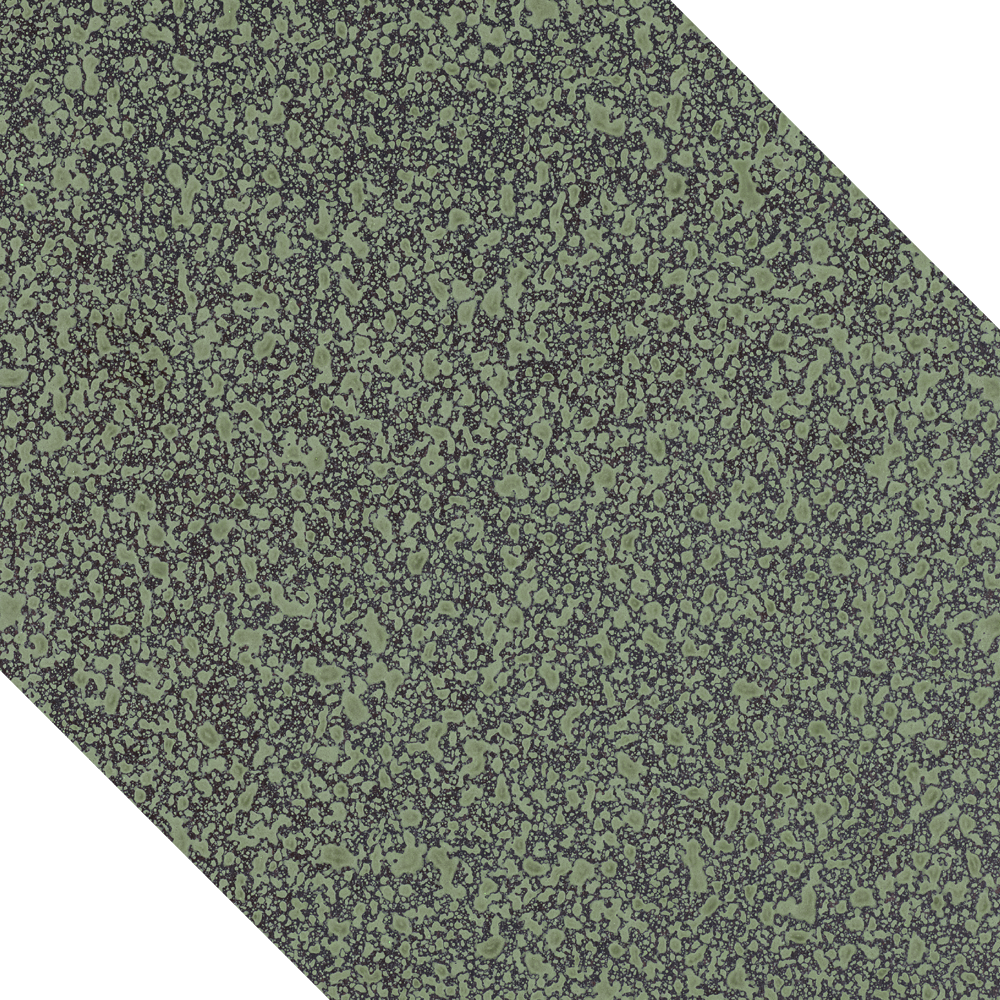 Green and black speckled surface, possibly a textured material or design.