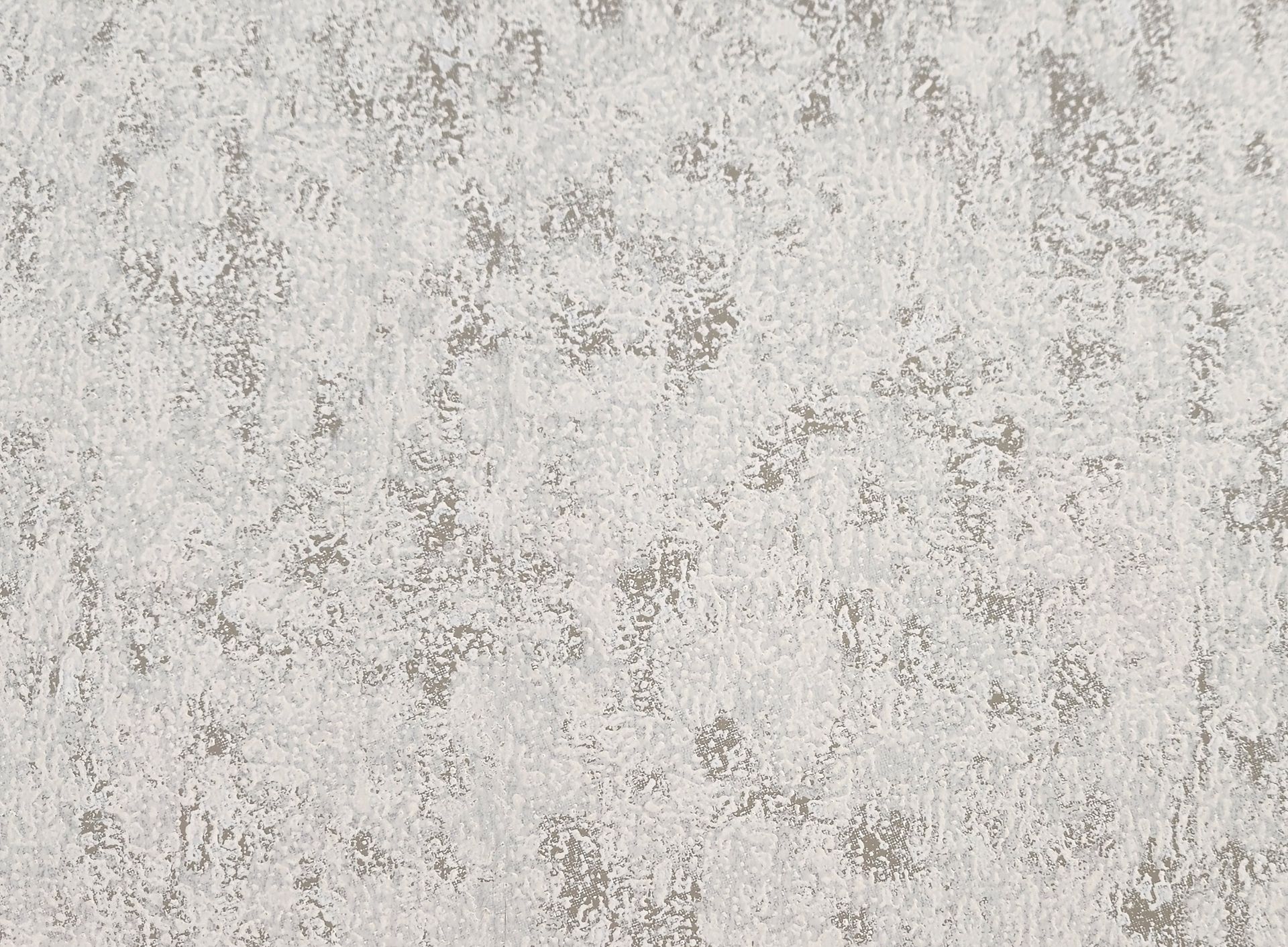 Textured white and gray wall.