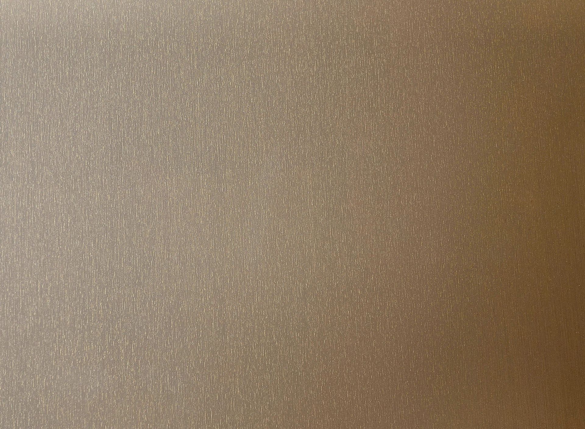 Tan foam board surface with a gradient from light to dark.