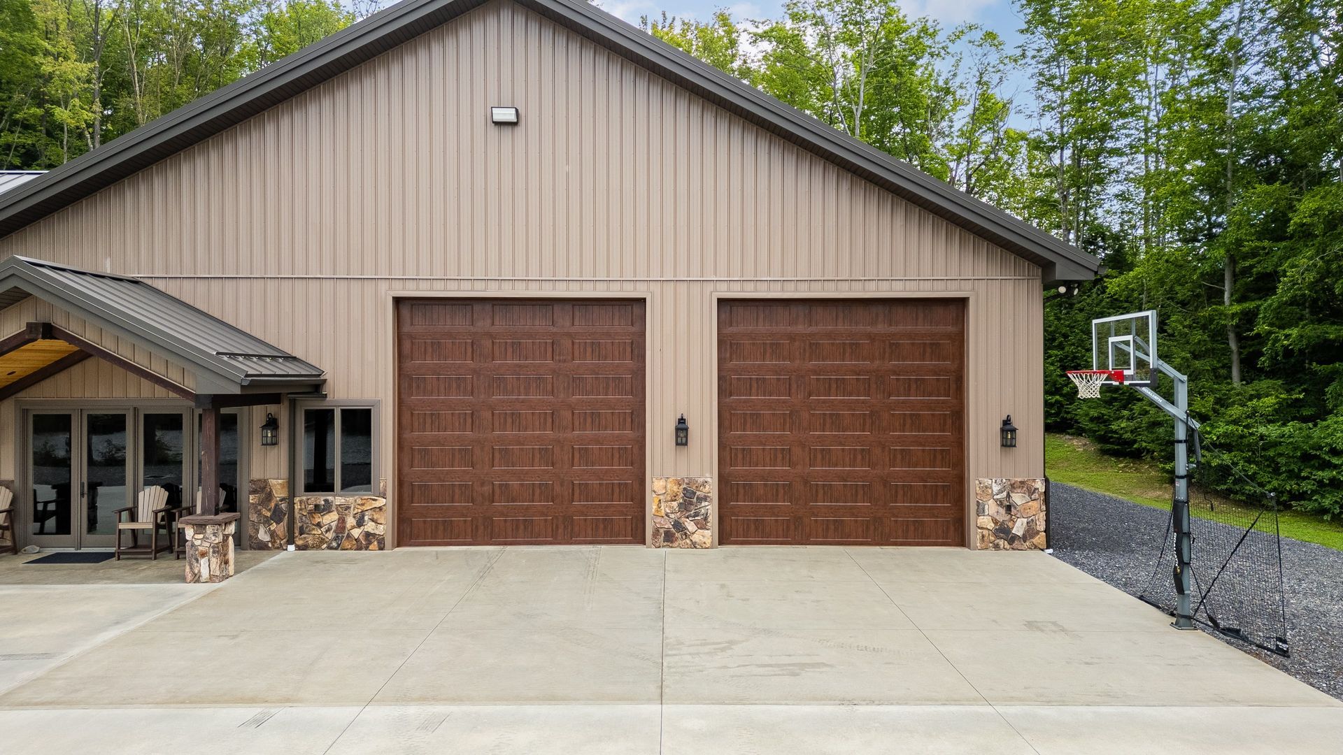 Double garage doors and metal roof exterior in State College.