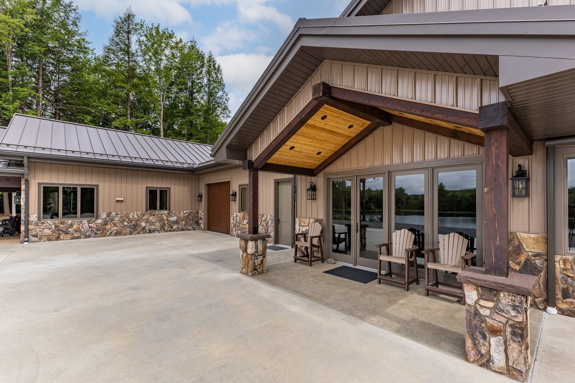 Front patio view with wood canopy and standing seam metal roof, State College.