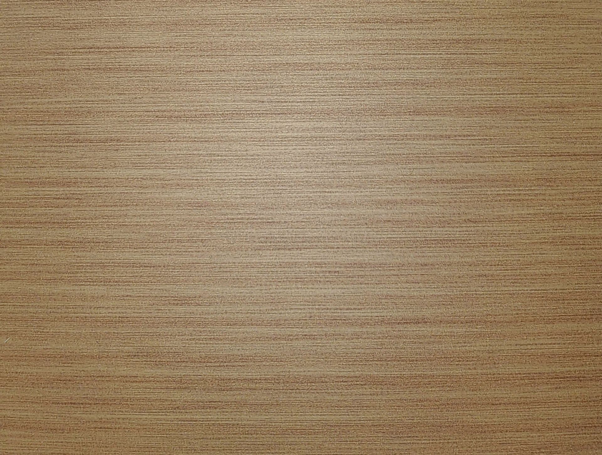 Close-up of a tan-brown, textured surface with horizontal lines.