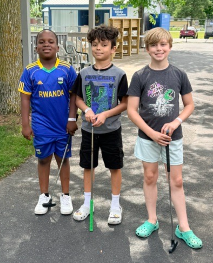 Trio of mini golfers at Summerland in June.