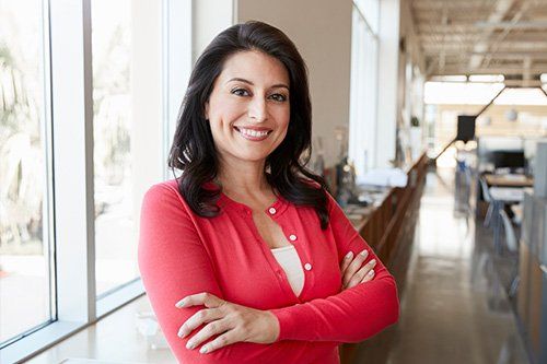 smile woman with folded arms
