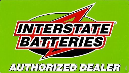 Interstate Batteries logo with red arrow and text on a green background. 