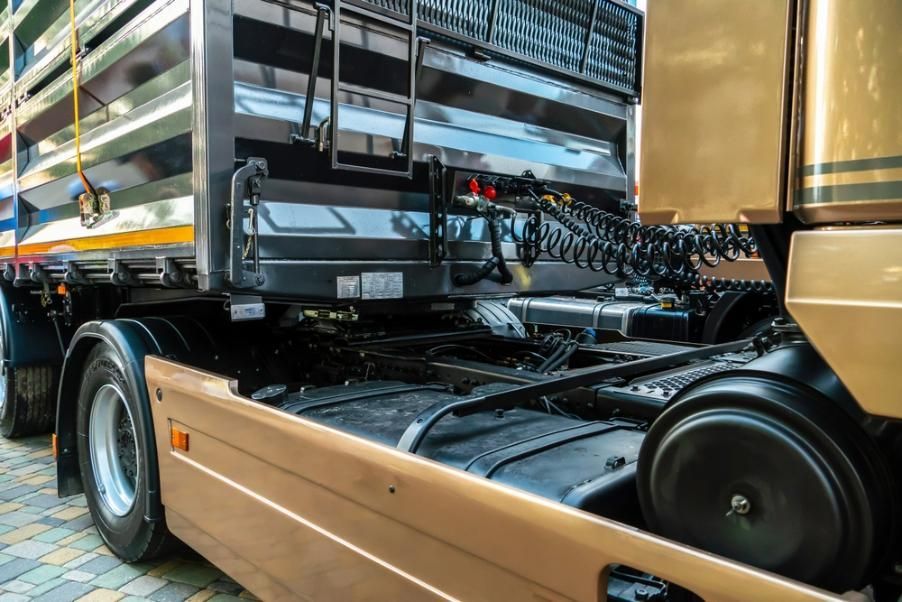 A Semi Truck With a Trailer Attached to It is Parked on the Side of the Road — Waring's Auto Electrical in South Geelong, VIC
