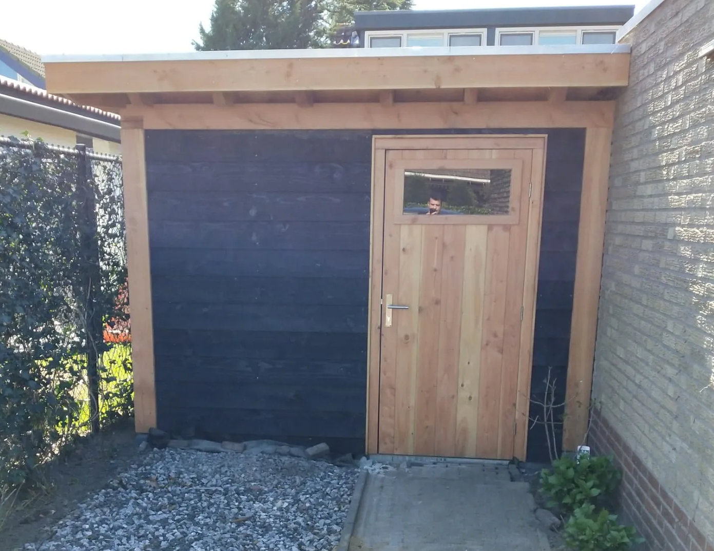 Schuur met zweeds rabat en afgeschuinde overstek