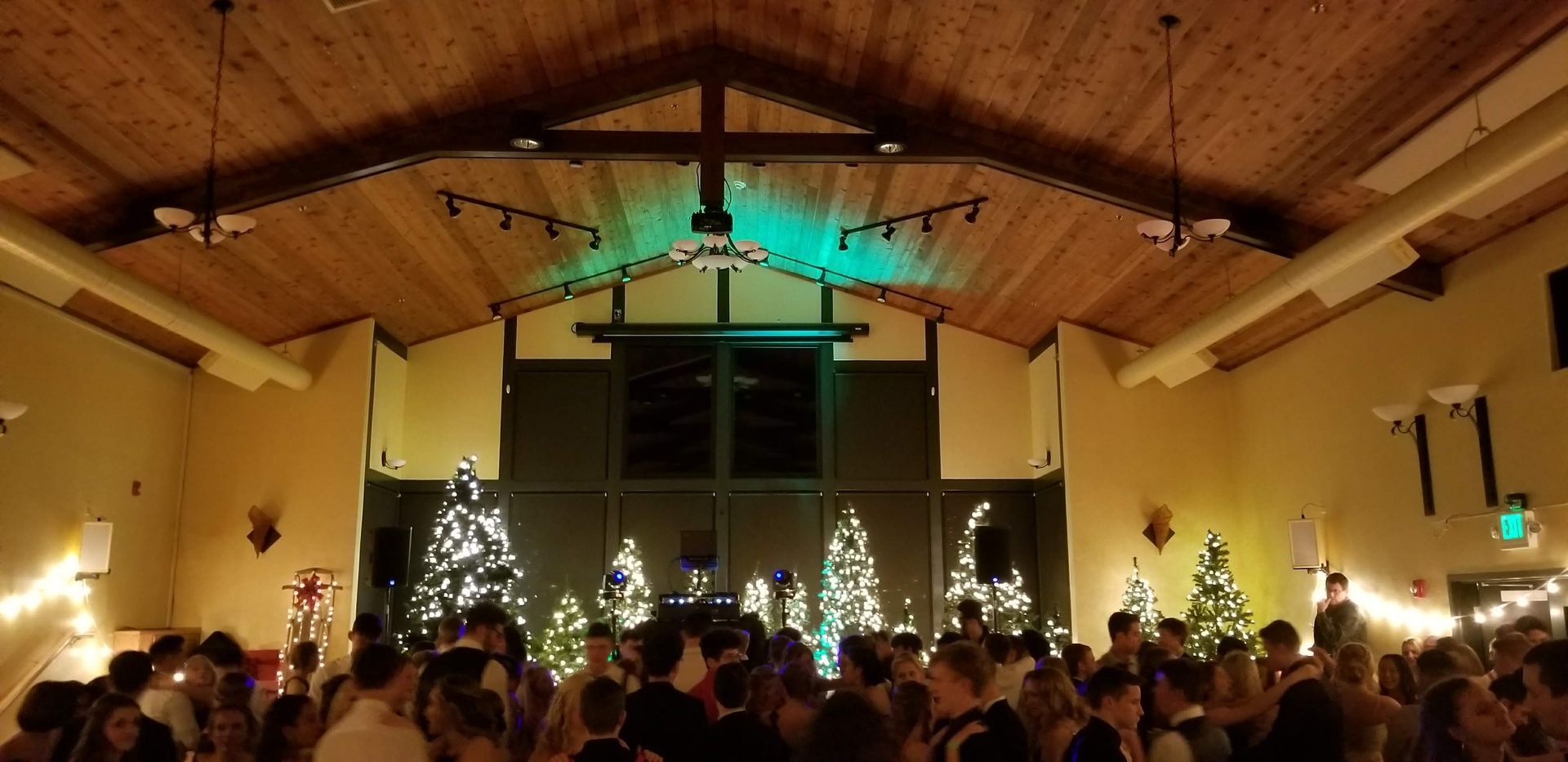 A picture taken from the back of the room at the homecoming for Santiam Christian School. Venue: Philomath Scout Lodge