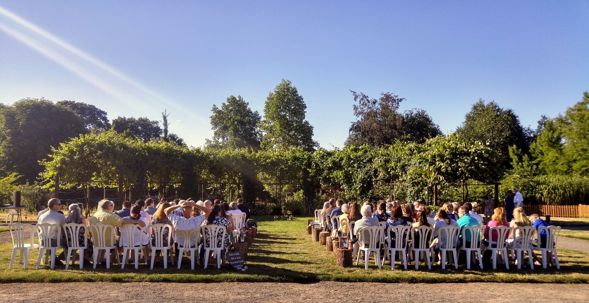 A picture of an outdoor ceremony. Venue: The Oregon Garden in Silverton, OR.