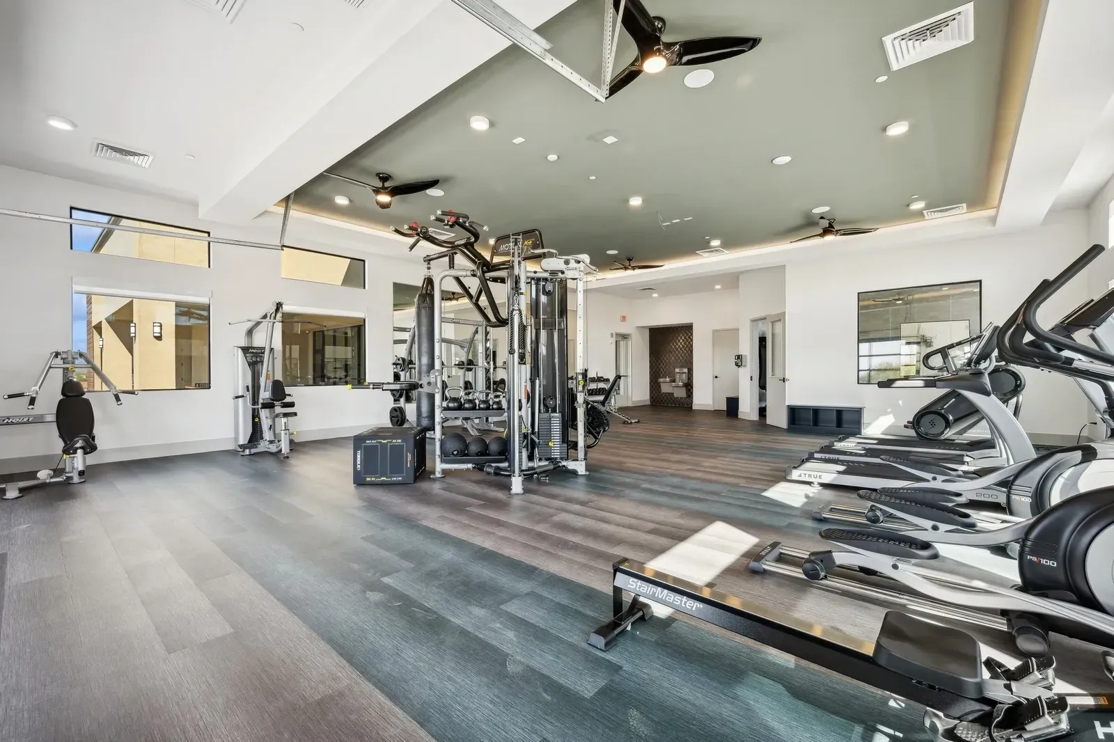 State-of-the-art fitness center featuring a wide array of cardio and strength training equipment for residents.