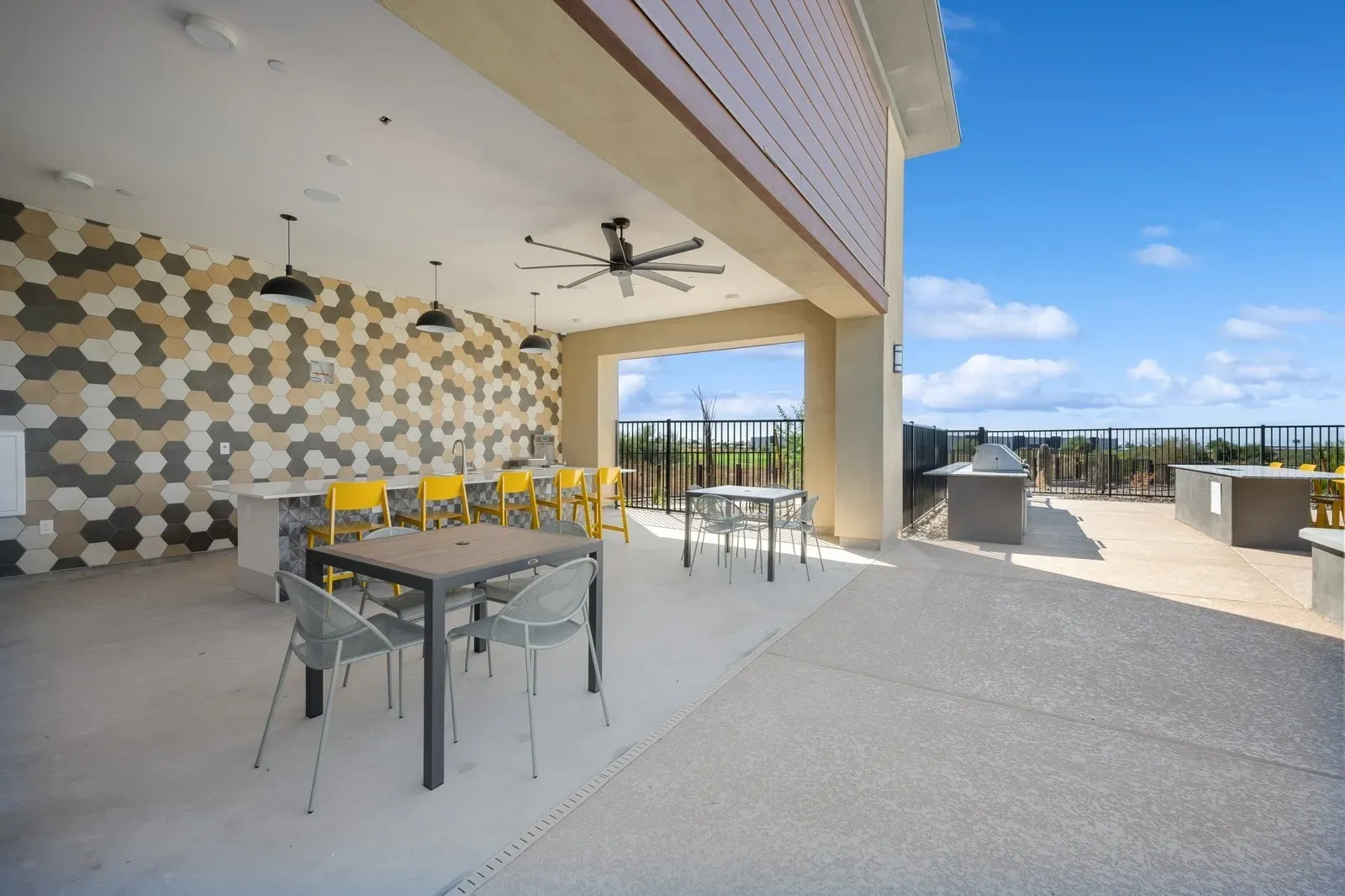 Enjoy outdoor cooking and dining with our modern amenities, including a fully equipped outdoor kitchen, comfortable seating, and scenic views.