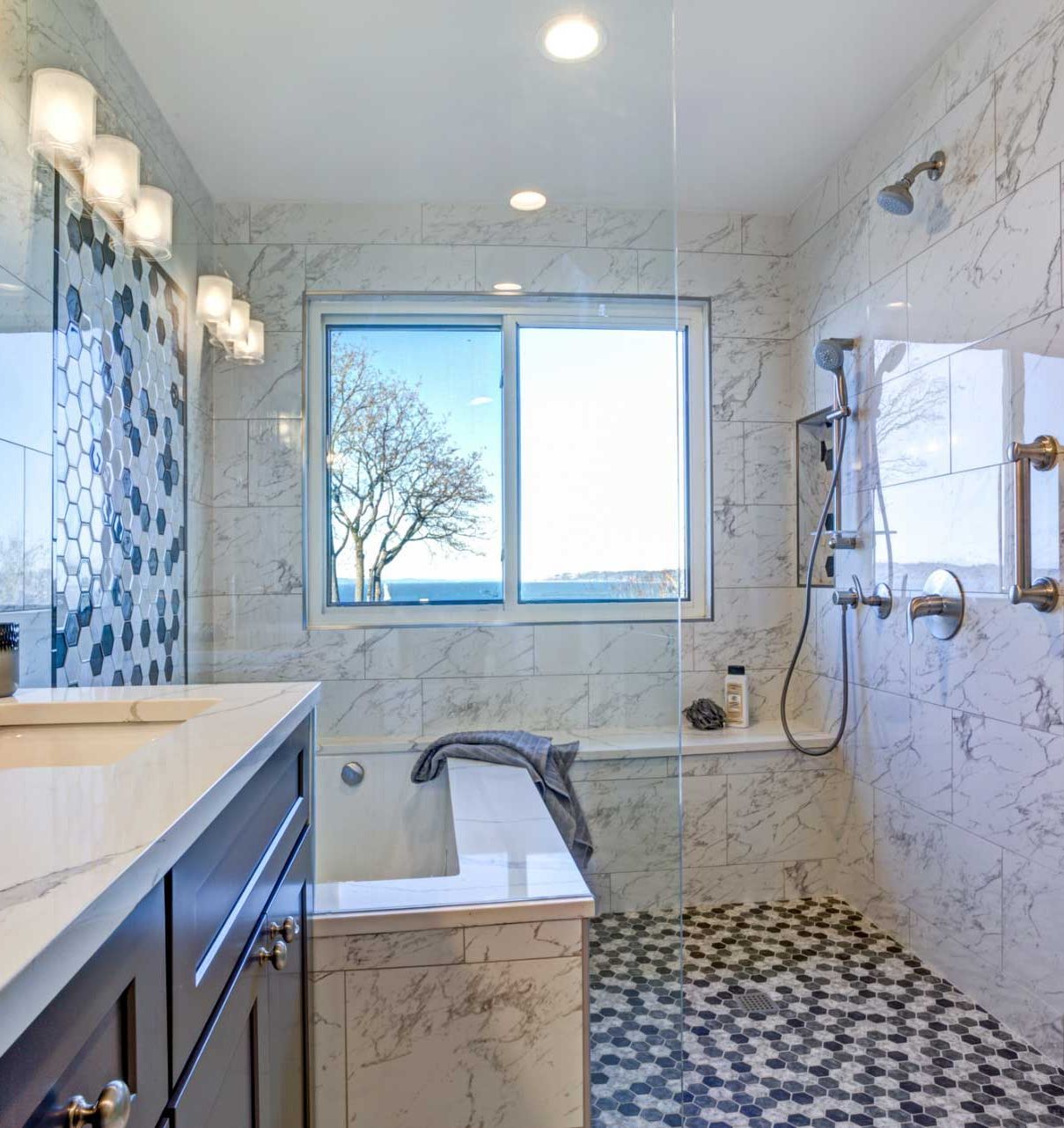 A bathroom with a bathtub and a window