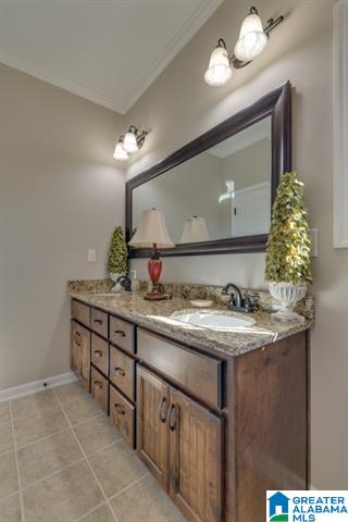 a bathroom with two sinks and a large mirror .