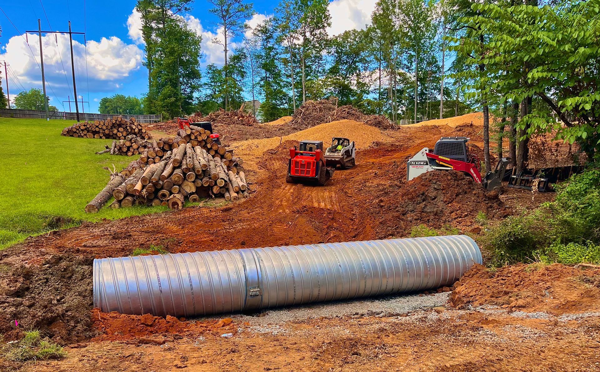 Rock Solid excavator dumping soil onto an off road truck