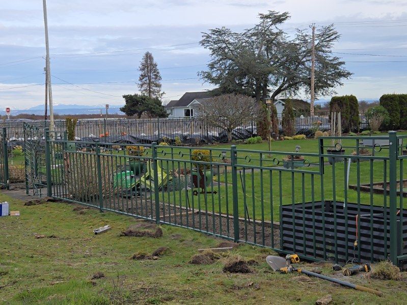 A fence is being built in a cemetery.