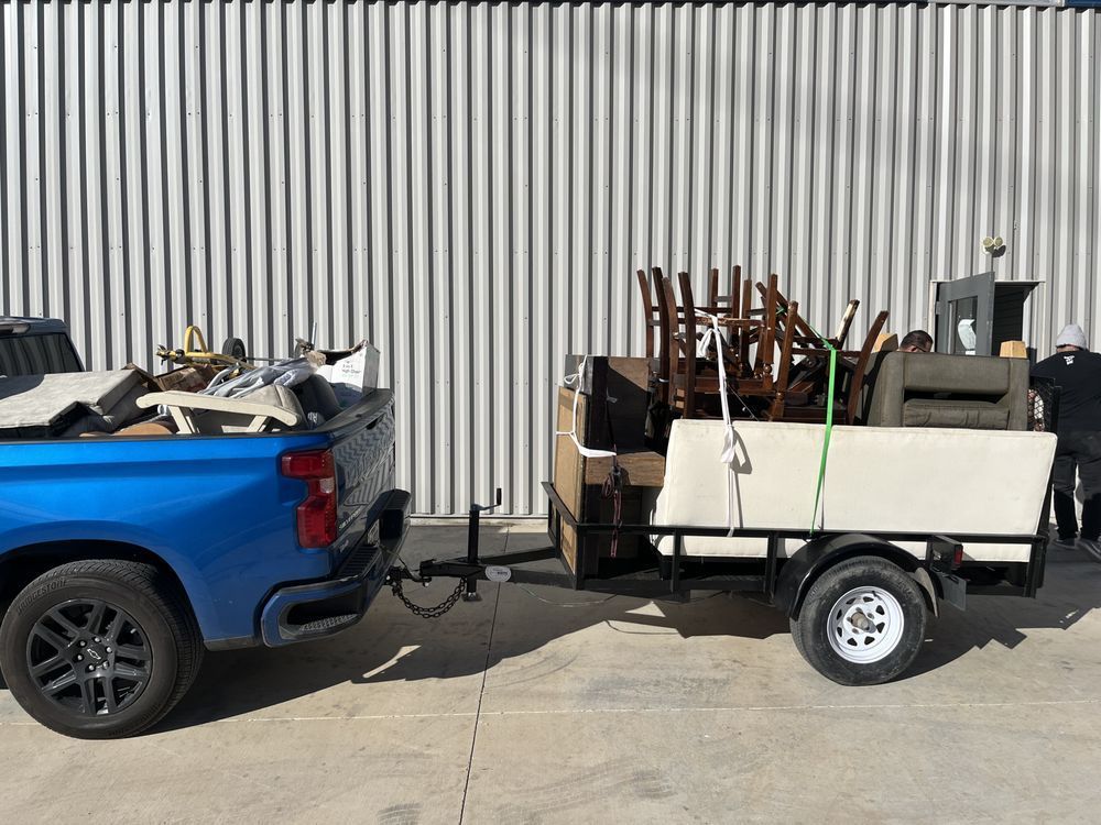 Blue Truck Is Towing a Trailer Full of Furniture — San Antonio, TX — Camacho’s Moving