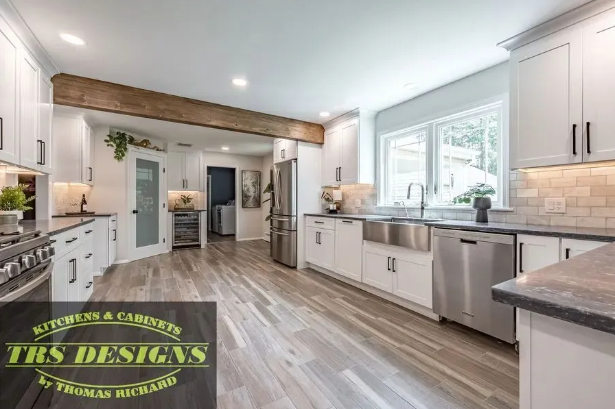 A bathroom with a sink , toilet and mirror.