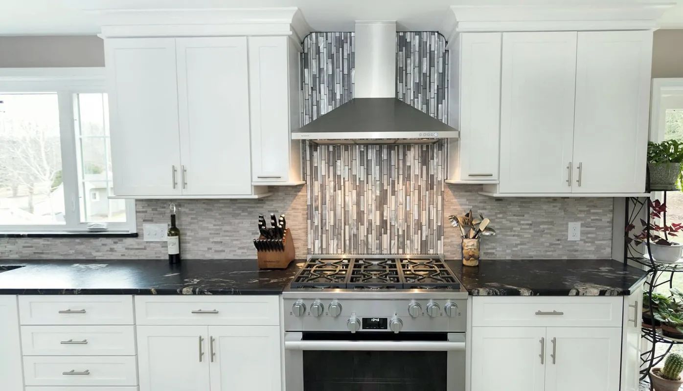 A kitchen with stainless steel appliances.