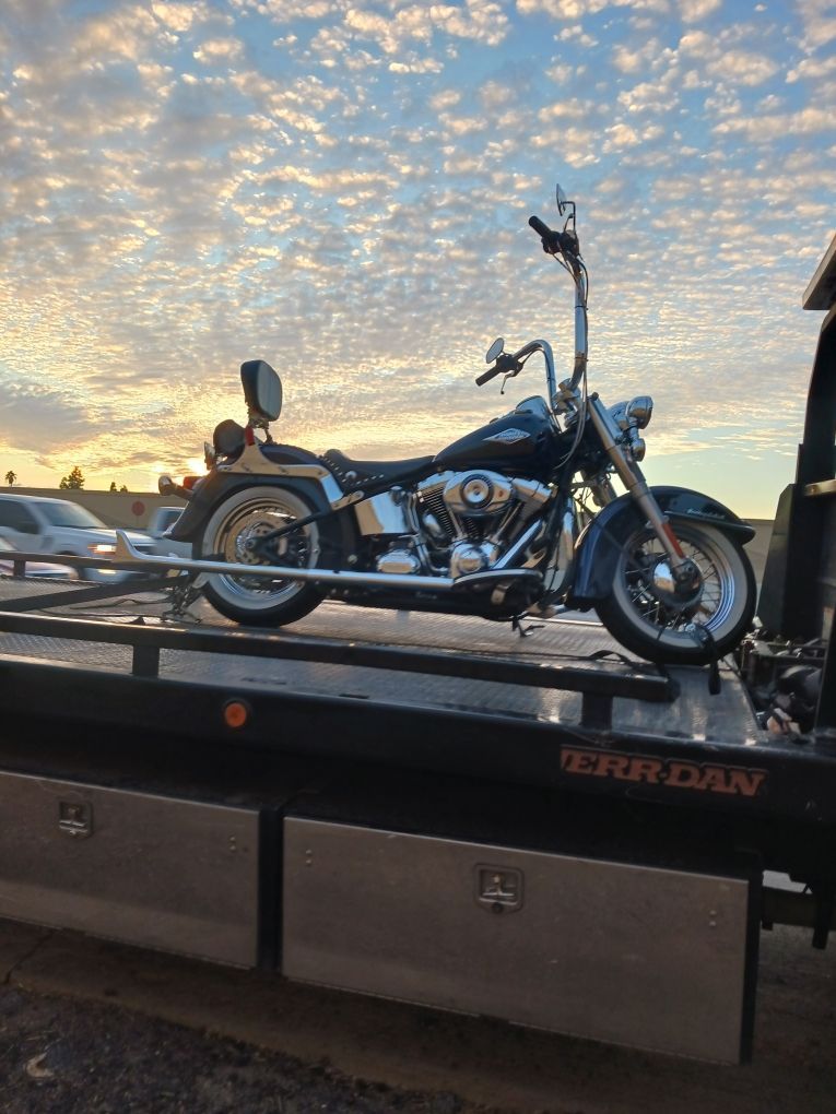 sun city towing a motorbike