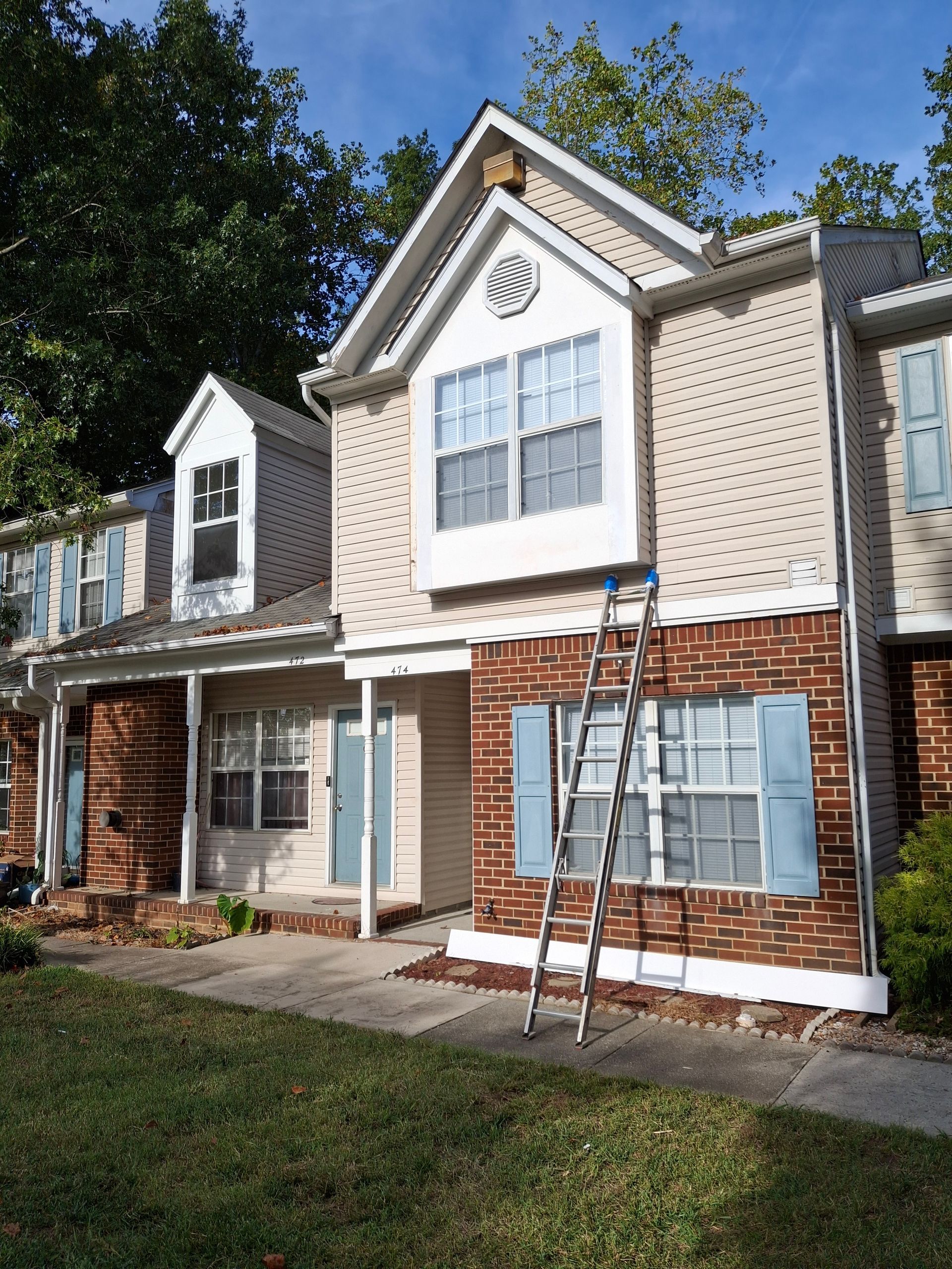 A house with a ladder in front of it
